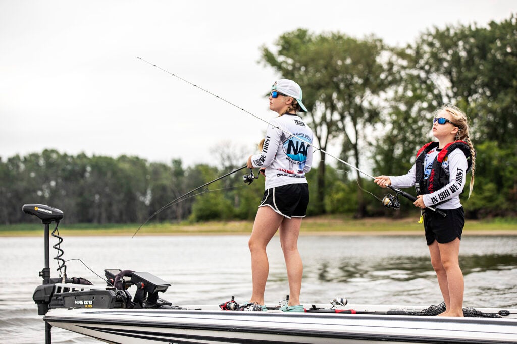 Charlotte Rayah Thoin fishing from boat