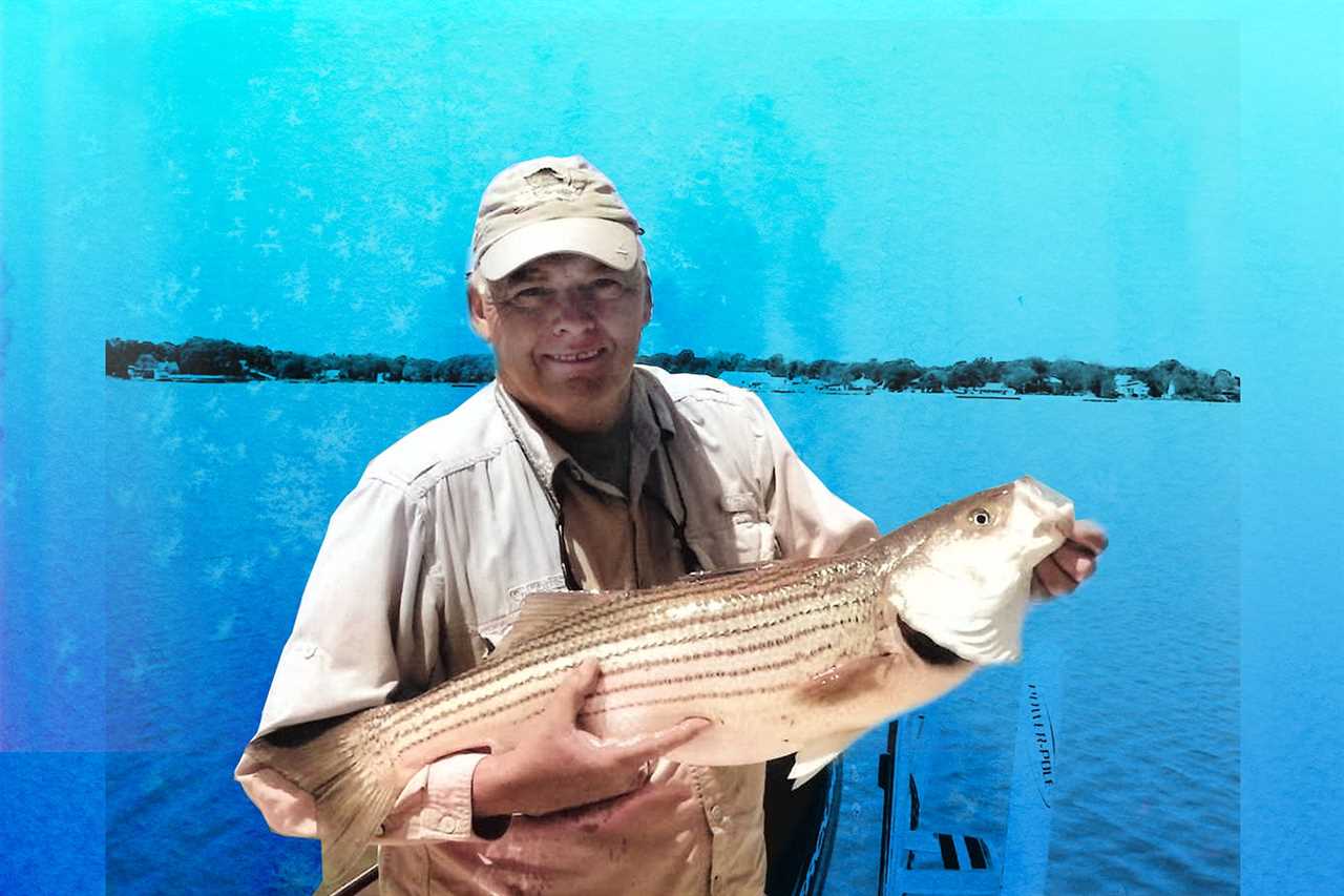 Angler holds striper