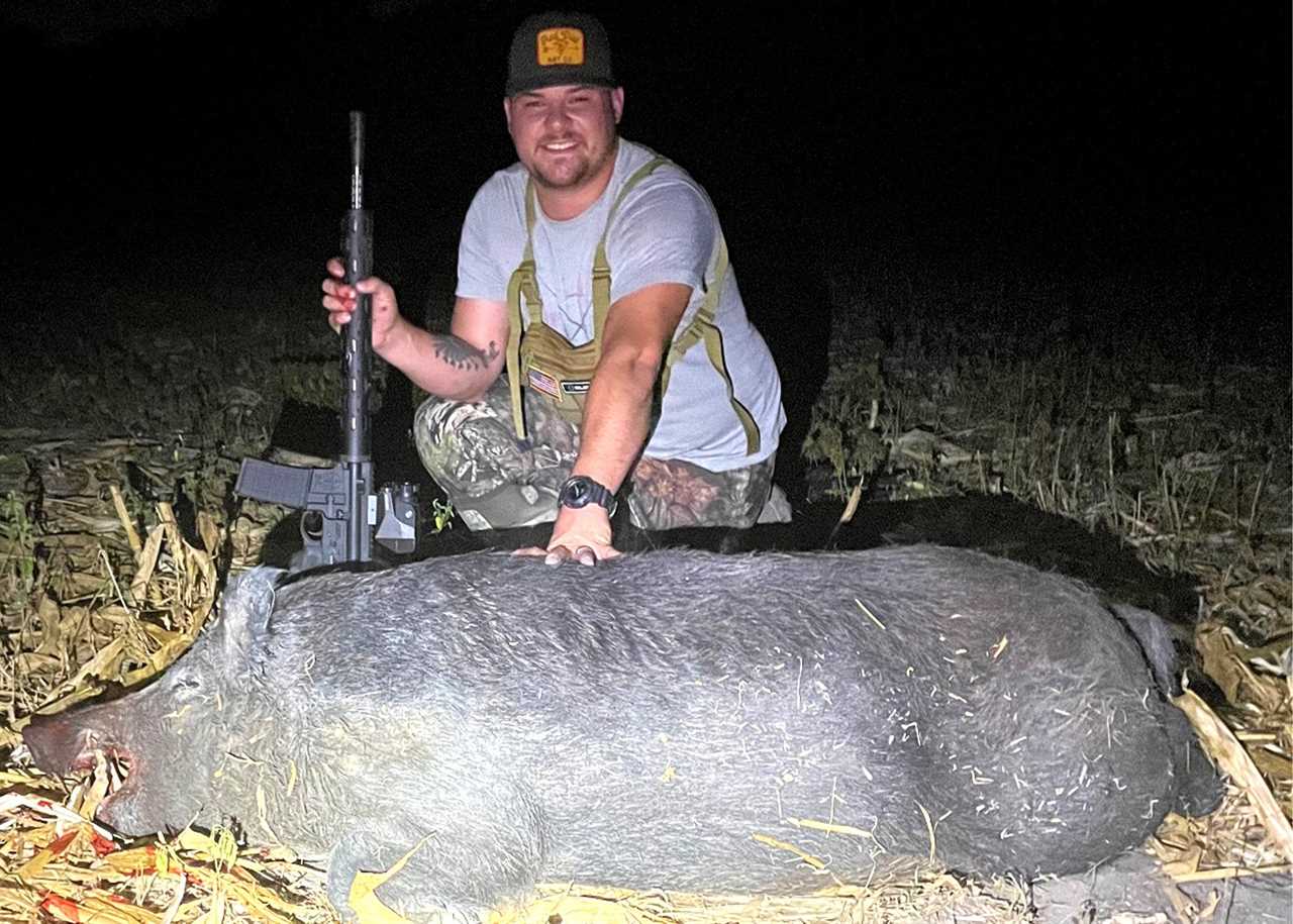 dakota landers with 350-pound hog