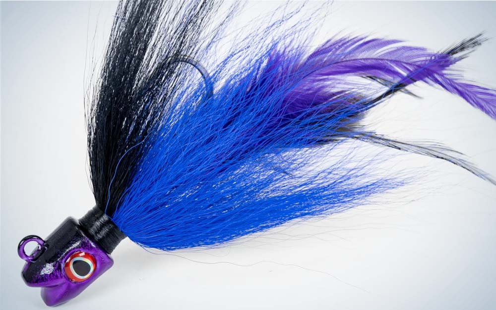 A blue, purple, and black best striped bass lure