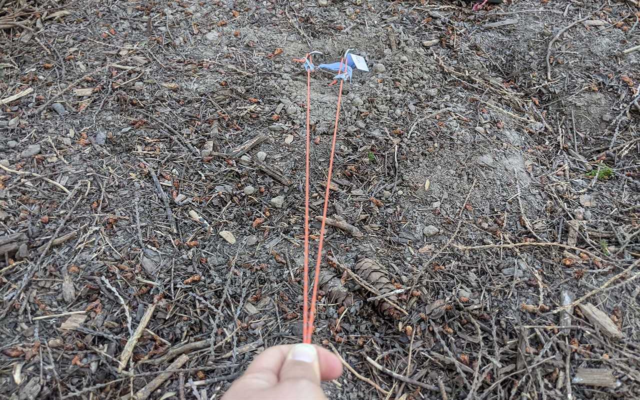 Pulling on two shepherd’s hook stakes during the first stage of testing. 