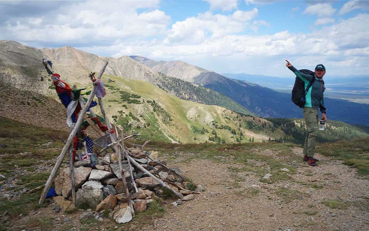 A man on top of a mountain