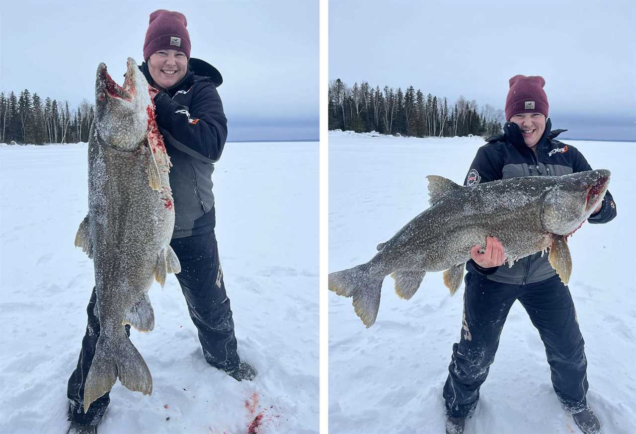 A woman holds up a massive 57-pound laker.