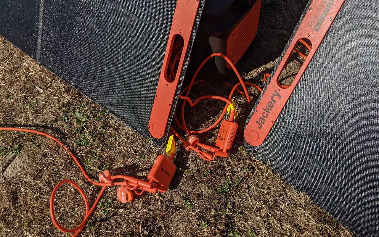 Four cables from each of the panels connected to two solar panels hooked up to the battery makes for a big cable-y mess.