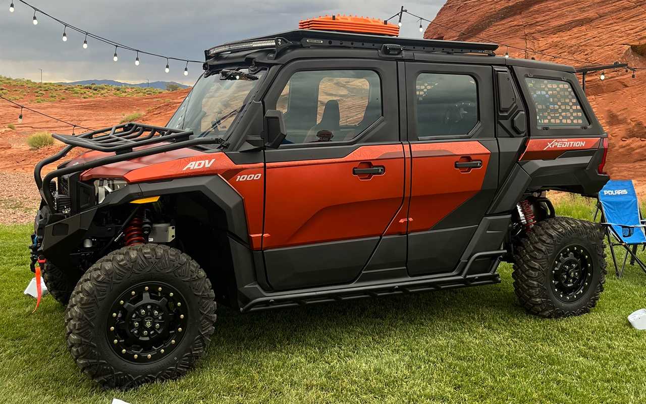 Polaris Xpedition ADV parked on grass.