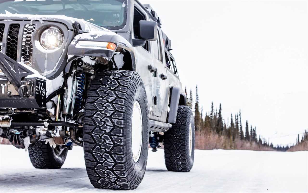 A Jeep sits in the snow.