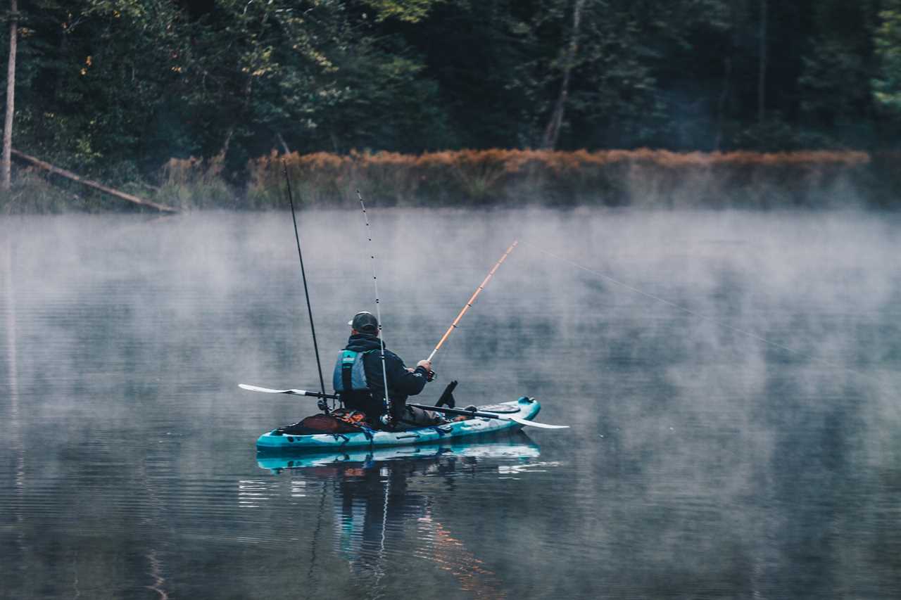 largemouth bass vs smallmouth, kayak fisherman