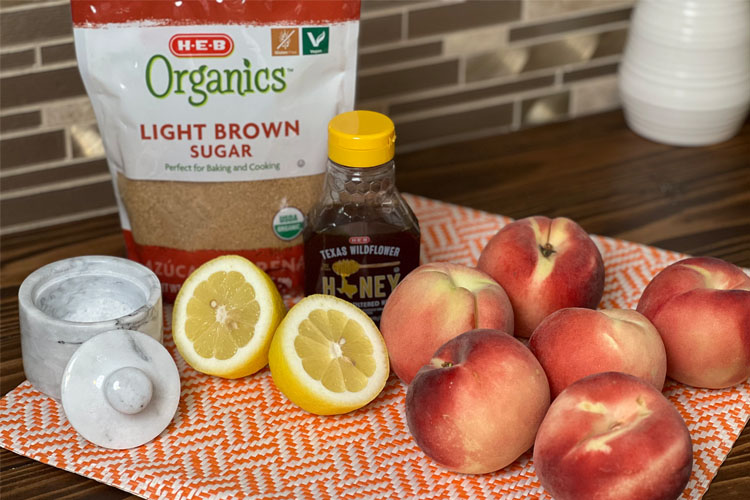 ingredients for peach cobbler laid out