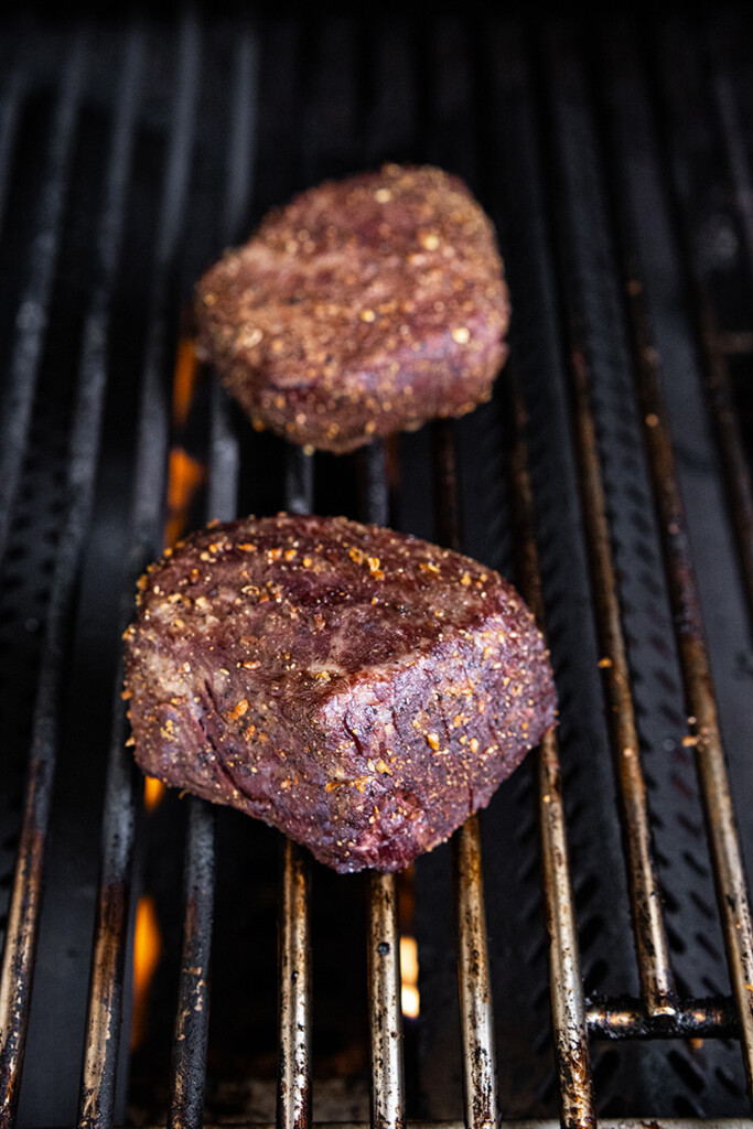 cooked top sirloin steak over direct heat