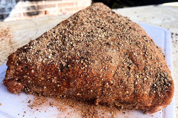 raw dino rib with pastrami rub 