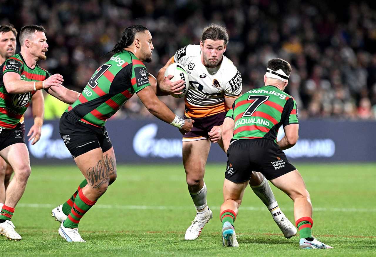 SUNSHINE COAST, AUSTRALIA - JULY 21: Patrick Carrigan of the Broncos takes on the defence during the round 21 NRL match between South Sydney Rabbitohs and Brisbane Broncos at Sunshine Coast Stadium on July 21, 2023 in Sunshine Coast, Australia. (Photo by Bradley Kanaris/Getty Images)