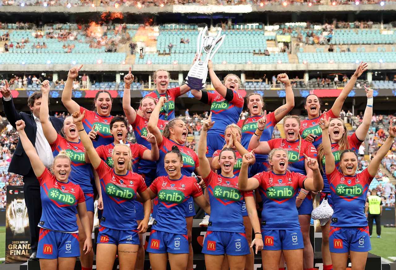 SYDNEY, AUSTRALIA - OCTOBER 01: Knights players celebrate with the Premiership Trophy after winning the 2023 NRLW Grand Final match between Newcastle Knights and Gold Coast Titans at Accor Stadium, on October 01, 2023, in Sydney, Australia. (Photo by Matt King/Getty Images)