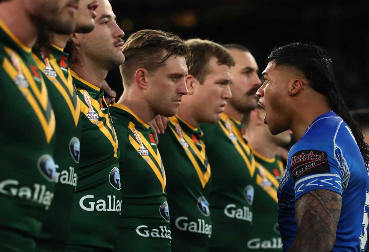 MANCHESTER, ENGLAND - NOVEMBER 19: Brian To'o of Samoa faces off with Cameron Munster of Australia during the Siva Tau prior to the Rugby League World Cup Final match between Australia and Samoa at Old Trafford on November 19, 2022 in Manchester, England. (Photo by Jan Kruger/Getty Images for RLWC)