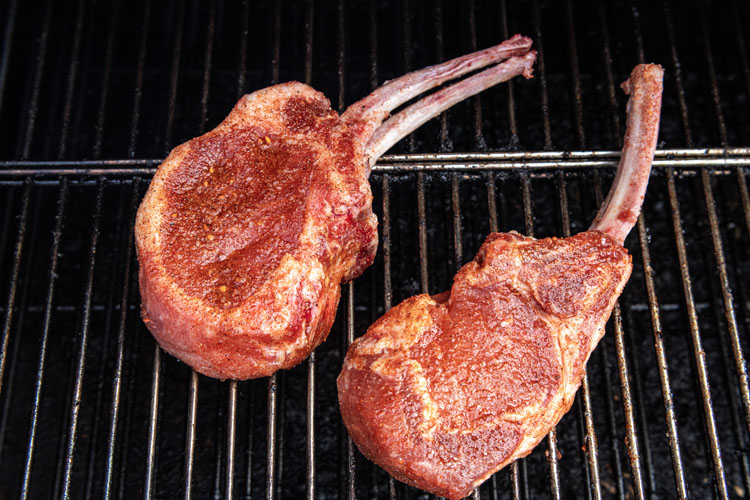 raw pork chops on the smoker