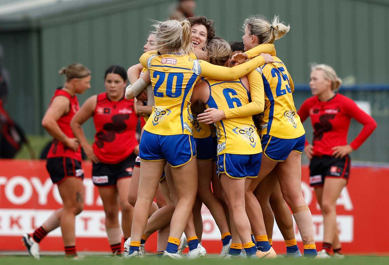 West Coast celebrate their win over Essendon.