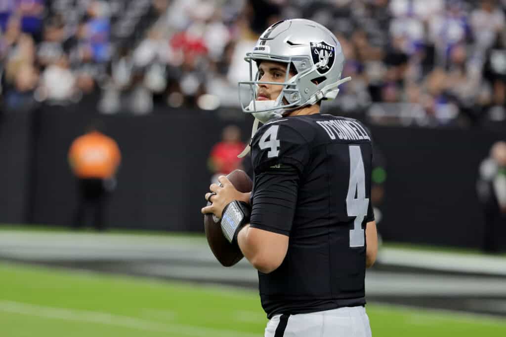 Aidan O'Connell #4 of the Las Vegas Raiders warms up before a game against the New York Giants at Allegiant Stadium on November 05, 2023 in Las Vegas, Nevada.