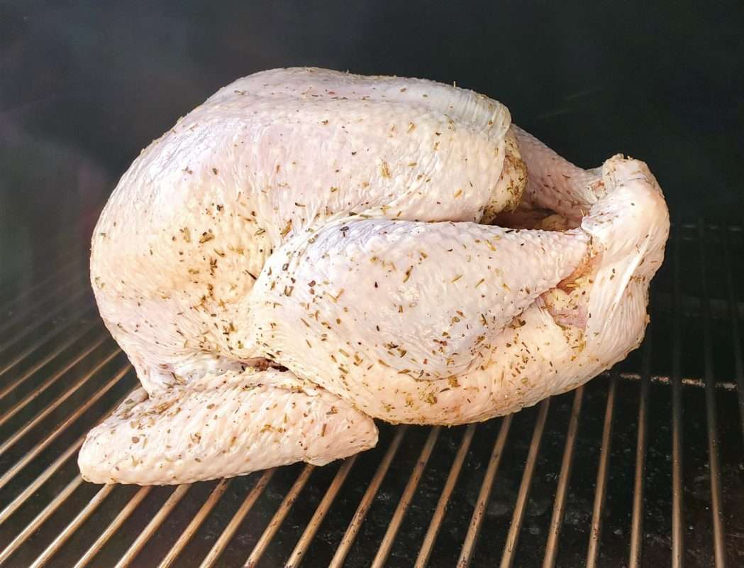 Seasoned turkey on a pellet grill