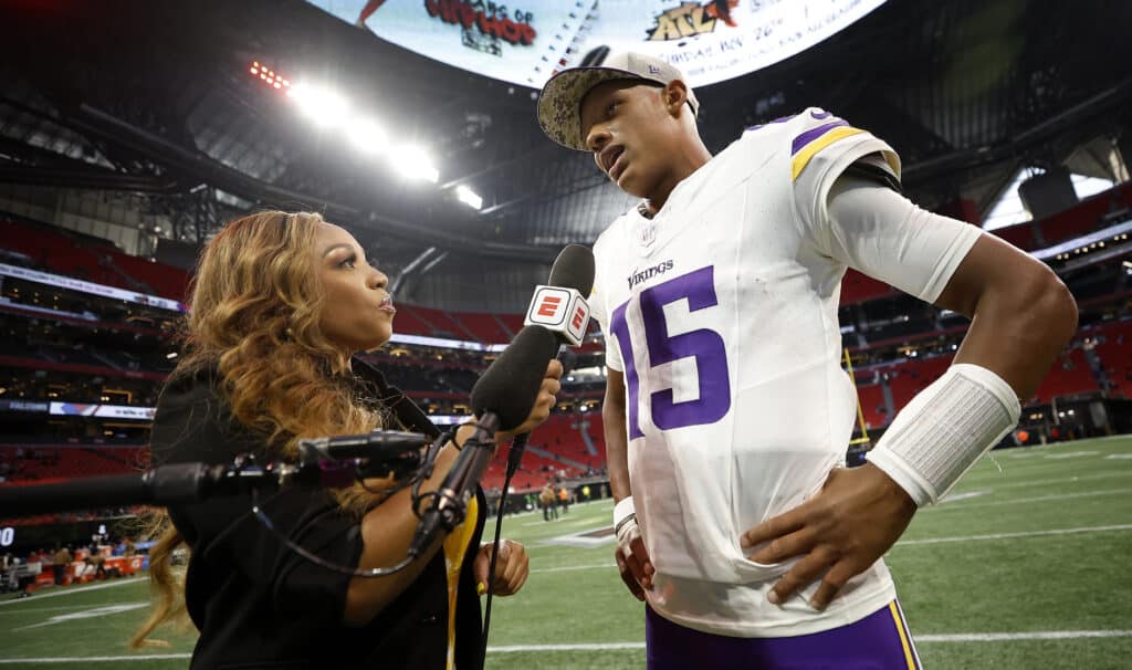 Joshua Dobbs #15 of the Minnesota Vikings is interviewed after the game against the Atlanta Falcons at Mercedes-Benz Stadium on November 05, 2023 in Atlanta, Georgia.