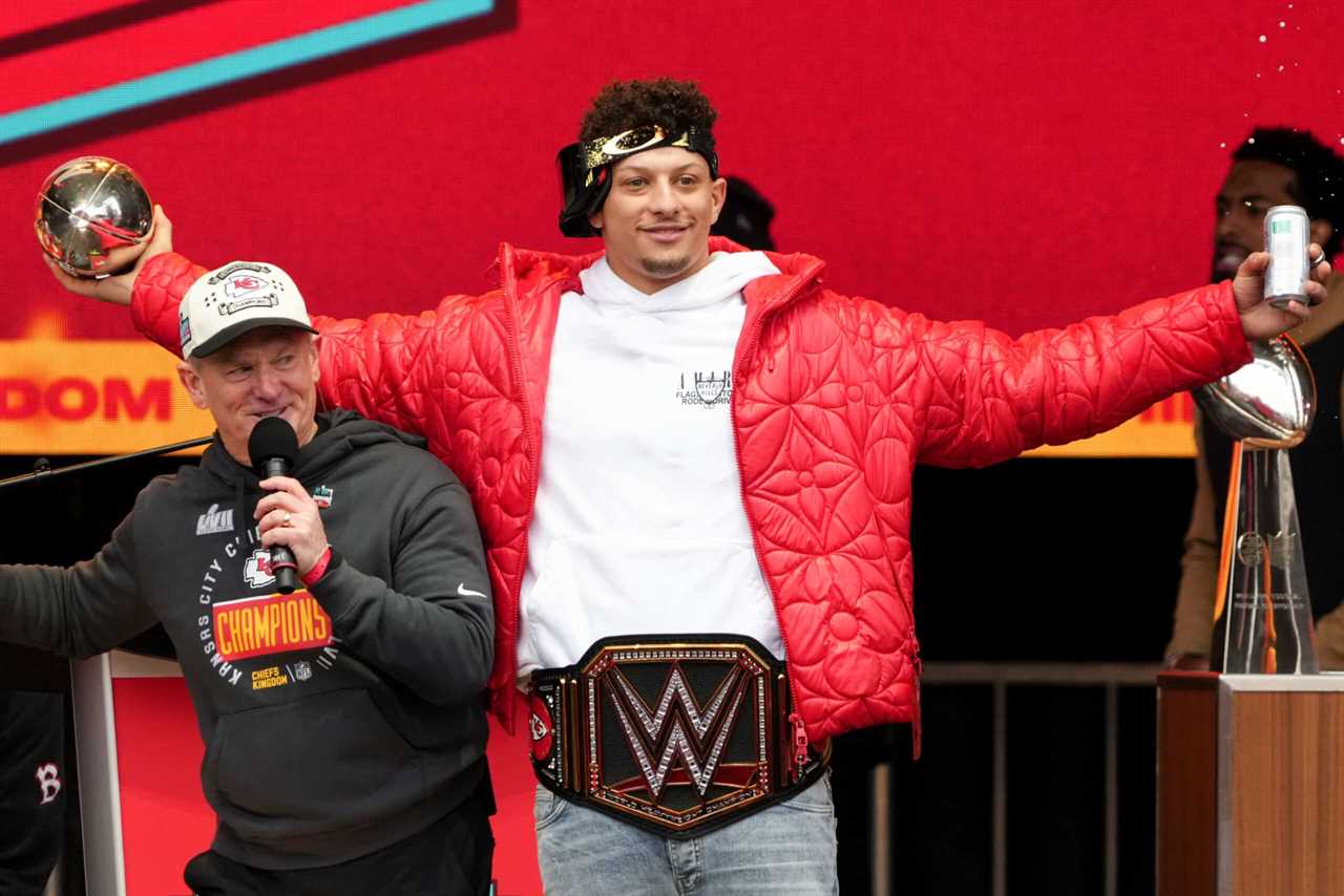 Patrick Mahomes #15 of the Kansas City Chiefs celebrates on stage during the Kansas City Chiefs Super Bowl LVII victory parade on February 15, 2023 in Kansas City, Missouri.