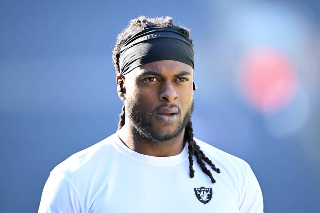 Davante Adams #17 of the Las Vegas Raiders warms up before the game against the Chicago Bears at Soldier Field on October 22, 2023 in Chicago, Illinois.