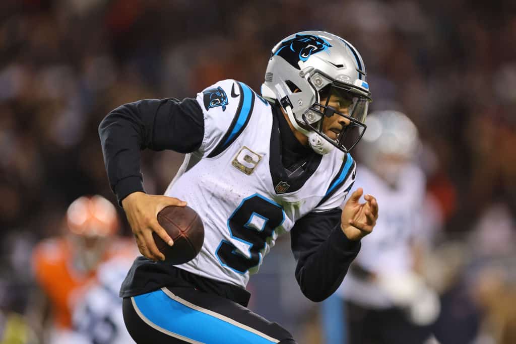 Bryce Young #9 of the Carolina Panthers rushes for a first down during the fourth quarter against the Chicago Bears at Soldier Field on November 09, 2023 in Chicago, Illinois.