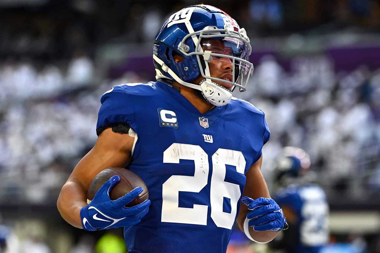 Saquon Barkley #26 of the New York Giants warms up against the Minnesota Vikings at U.S. Bank Stadium on December 24, 2022 in Minneapolis, Minnesota.