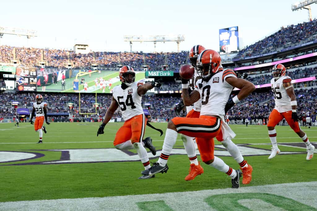 Greg Newsome II #0 of the Cleveland Browns celebrates a touchdown against the Baltimore Ravens during the fourth quarter at M&T Bank Stadium on November 12, 2023 in Baltimore, Maryland.