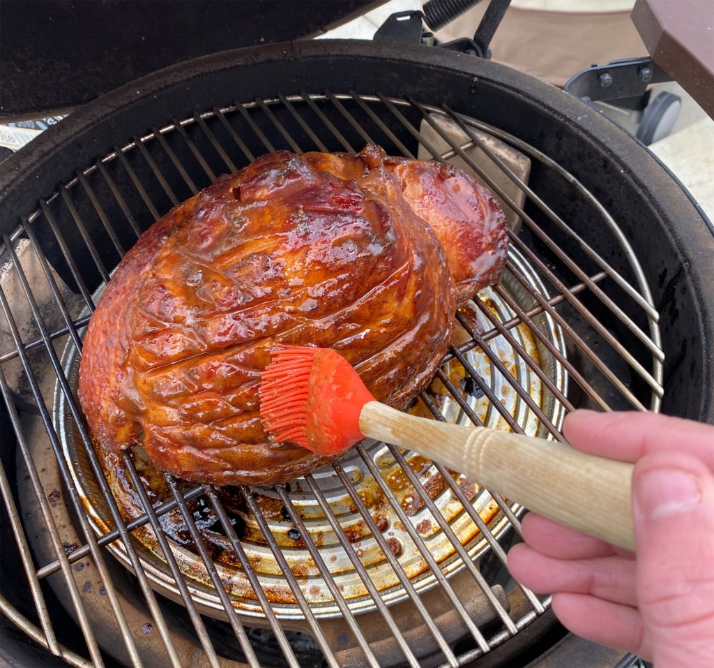 grill girl, glazing the ham, big green egg