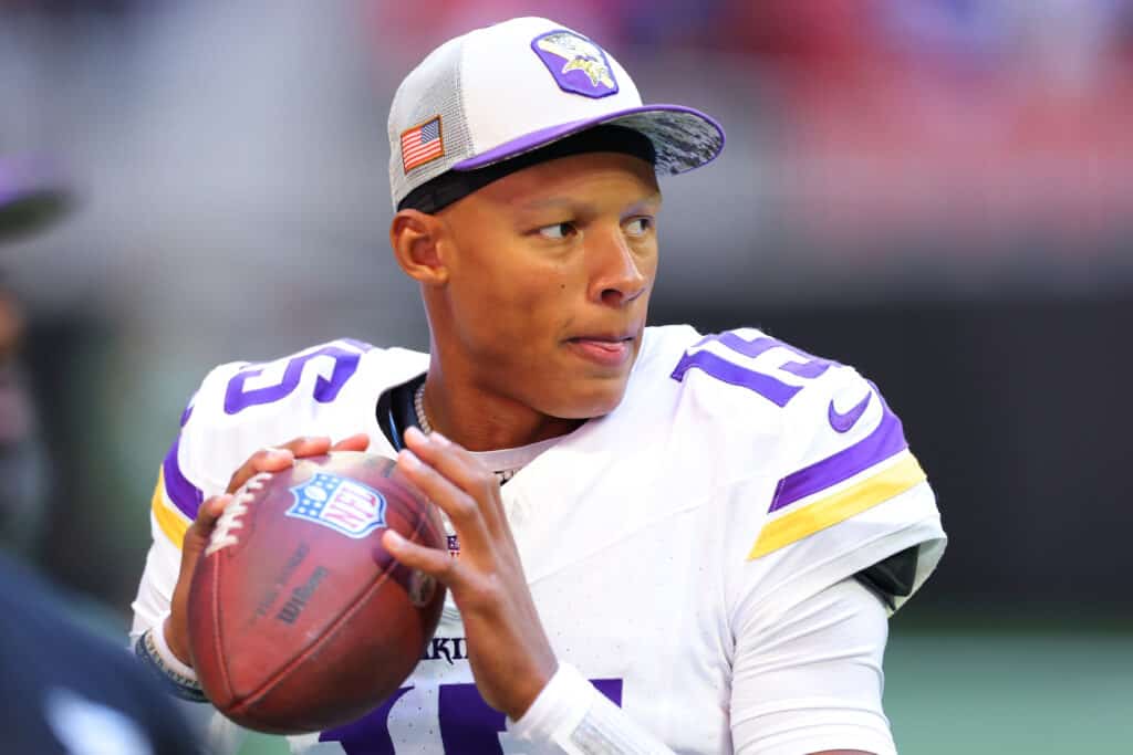 Joshua Dobbs #15 of the Minnesota Vikings warms up before the game against the Atlanta Falcons at Mercedes-Benz Stadium on November 05, 2023 in Atlanta, Georgia.