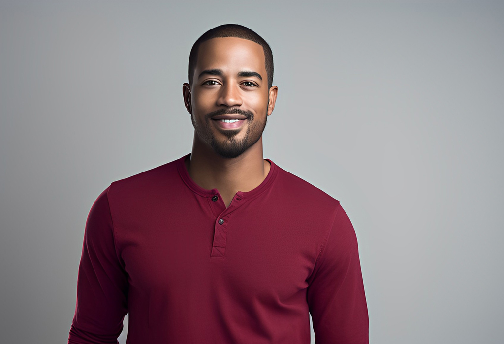 smiling man wearing henley shirt