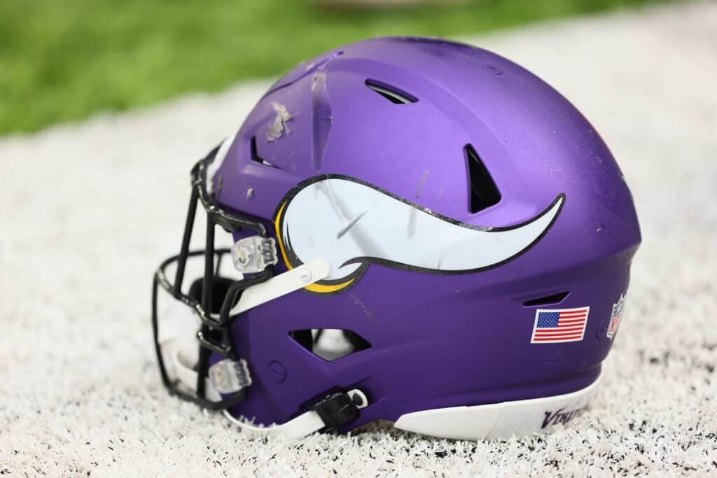 A Minnesota Vikings helmet on the field before a practice at U.S. Bank Stadium on August 07, 2021 in Minneapolis, Minnesota.