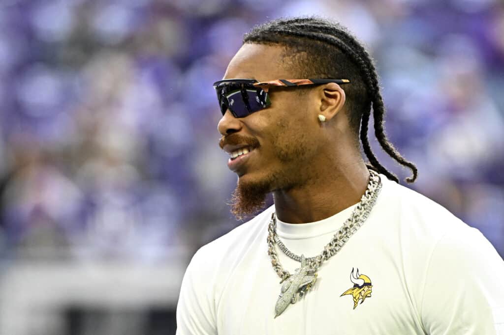 Justin Jefferson #18 of the Minnesota Vikings on the field before the game against the New Orleans Saints at U.S. Bank Stadium on November 12, 2023 in Minneapolis, Minnesota.