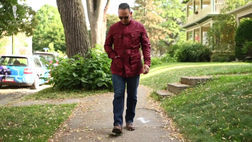 Raphael in boot cut jeans and boots.