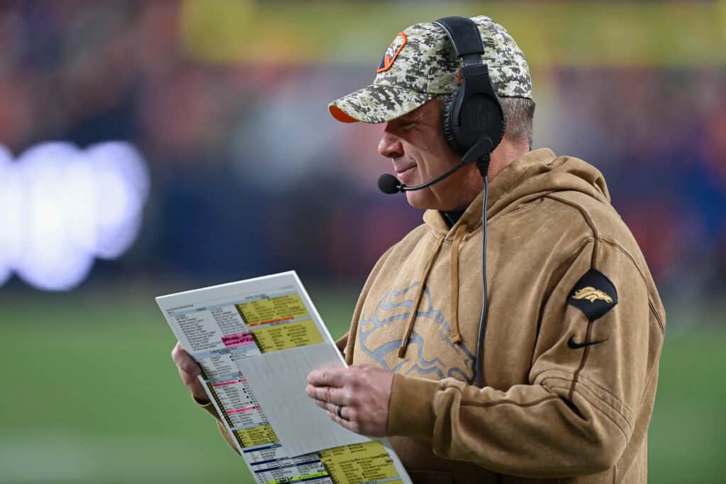 Head coach Sean Payton of the Denver Broncos looks over his play-card during the second quarter of the NFL game against the Minnesota Vikings at Empower Field At Mile High on November 19, 2023 in Denver, Colorado.