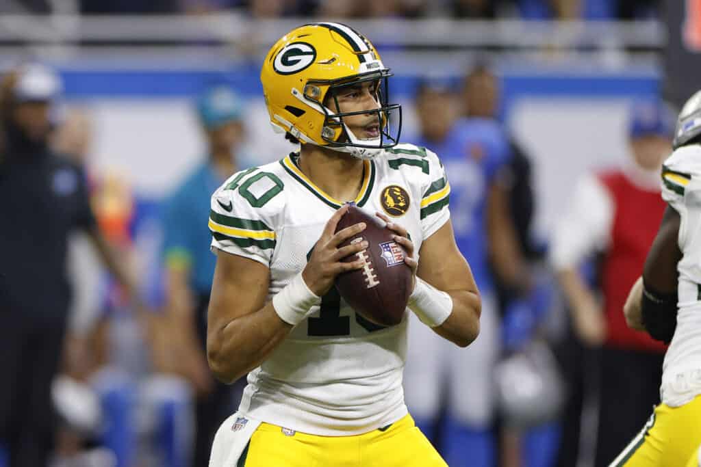 Jordan Love #10 of the Green Bay Packers looks to pass against the Detroit Lions during the third quarter of the game at Ford Field on November 23, 2023 in Detroit, Michigan.