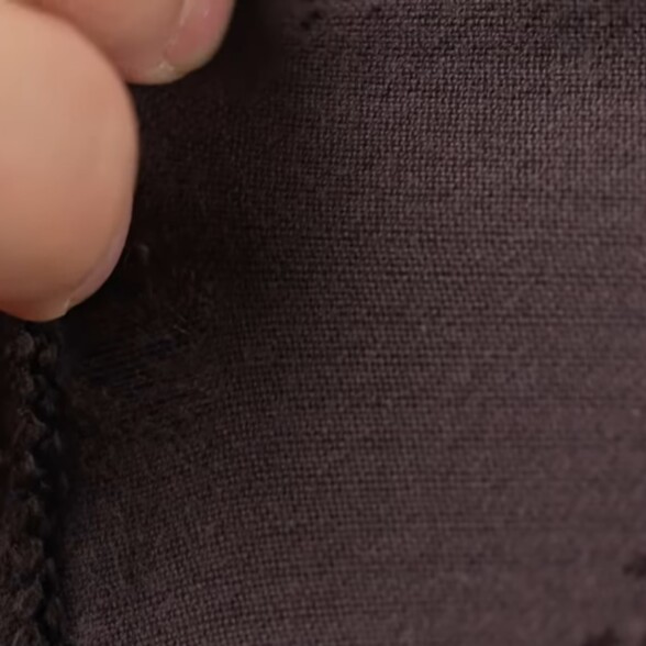 Photo of Balding corduroy on which the cords have literally rubbed off with regular wear