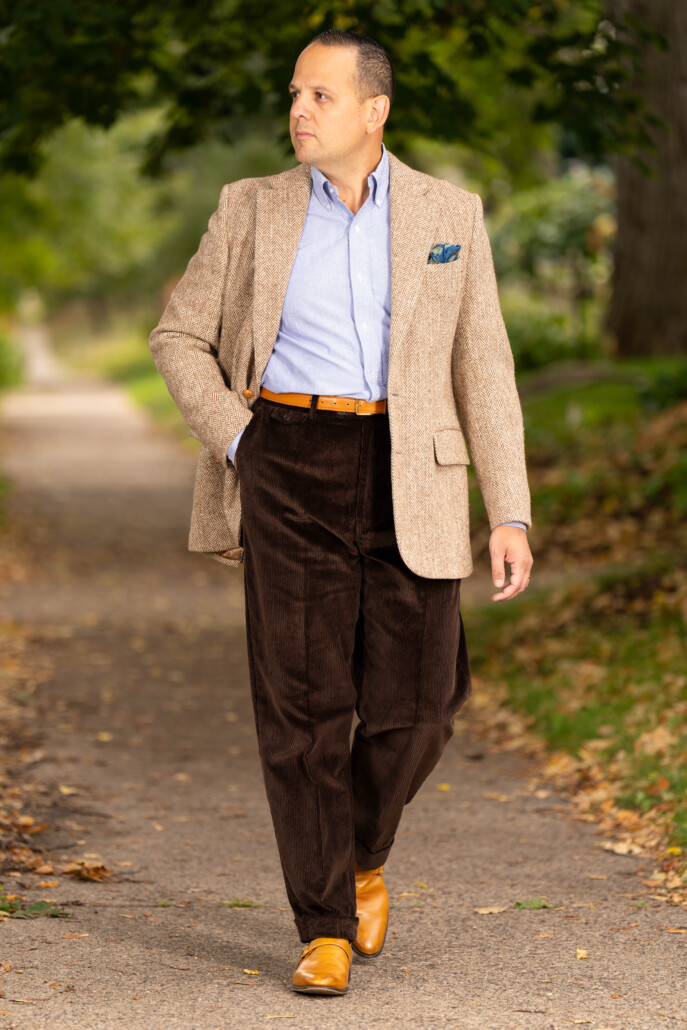 Photo of Raphael wearing Dark brown corduroy with herringbone sport coat