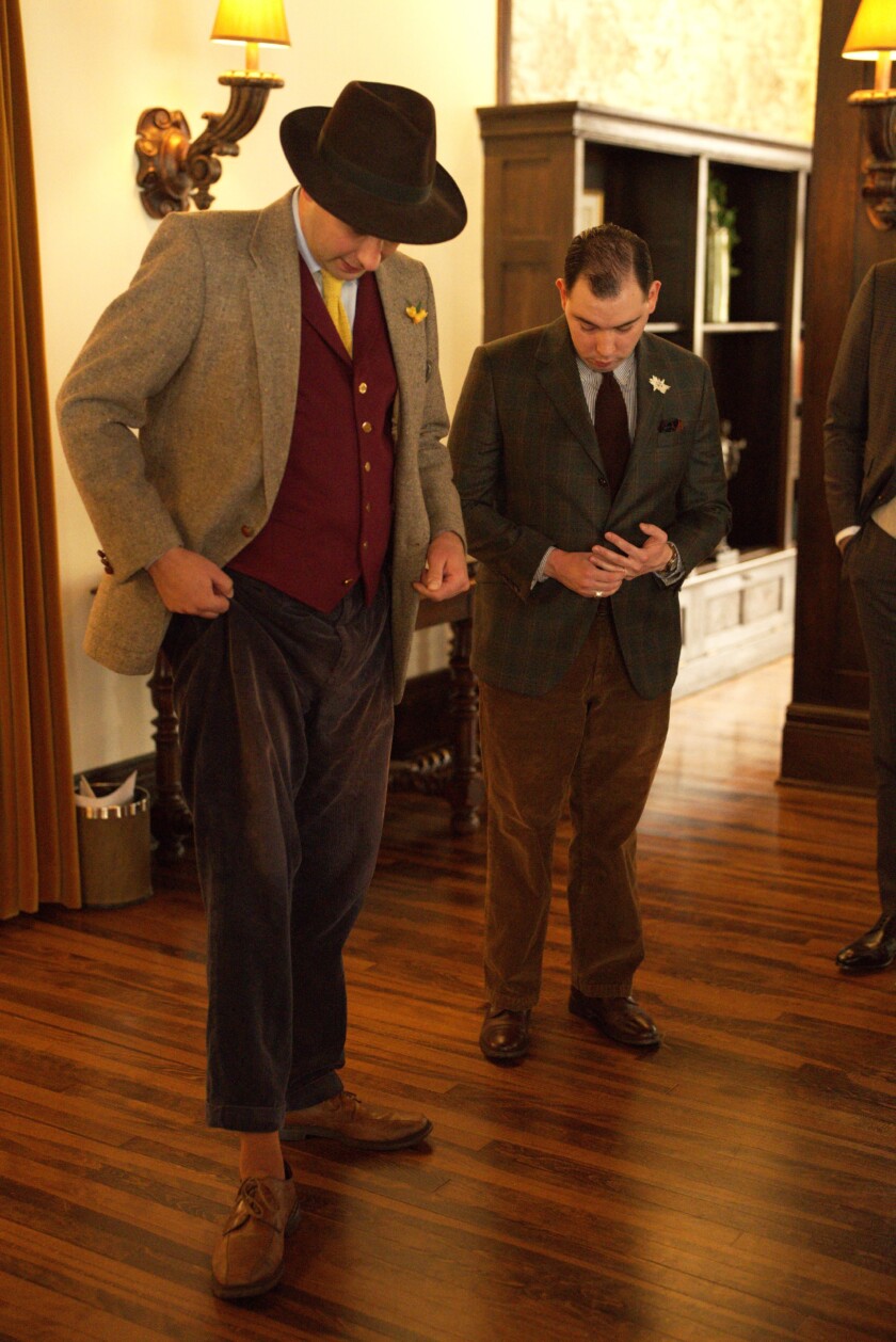 Photo of a man Showing off a pair of corduroy trousers