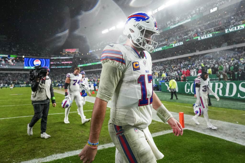 PHILADELPHIA, PENNSYLVANIA - NOVEMBER 26: Josh Allen #17 of the Buffalo Bills walks off the field after his team's 37-34 overtime loss against the Philadelphia Eagles at Lincoln Financial Field on November 26, 2023 in Philadelphia, Pennsylvania.