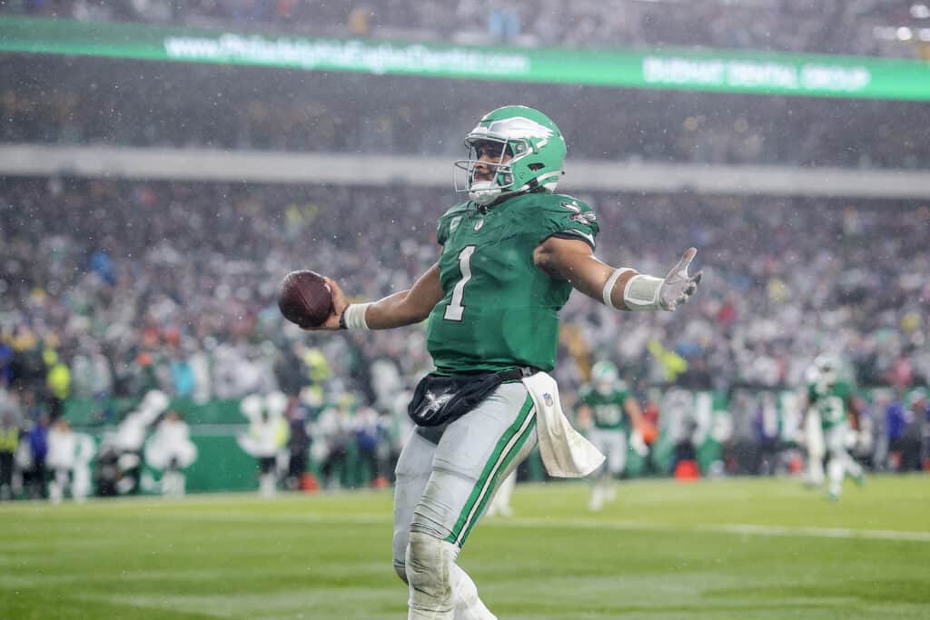 PHILADELPHIA, PENNSYLVANIA - NOVEMBER 26: Jalen Hurts #1 of the Philadelphia Eagles reacts after scoring the game winning touchdown in overtime against the Buffalo Bills at Lincoln Financial Field on November 26, 2023 in Philadelphia, Pennsylvania.