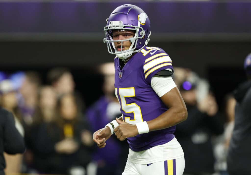 MINNEAPOLIS, MINNESOTA - NOVEMBER 27: Joshua Dobbs #15 of the Minnesota Vikings warms up prior to a game against the Chicago Bears at U.S. Bank Stadium on November 27, 2023 in Minneapolis, Minnesota