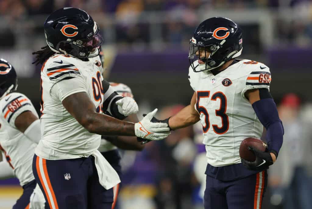 MINNEAPOLIS, MINNESOTA - NOVEMBER 27: T.J. Edwards #53 of the Chicago Bears celebrates with teammates after an interception during the third quarter against the Minnesota Vikings at U.S. Bank Stadium on November 27, 2023 in Minneapolis, Minnesota.
