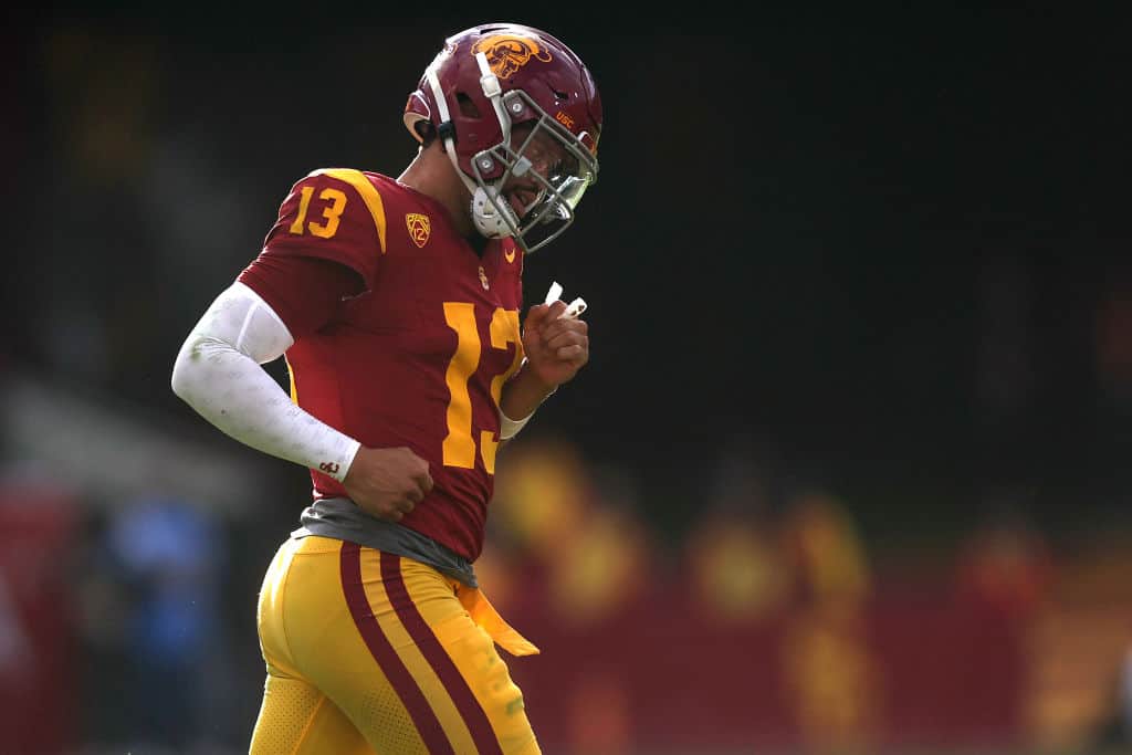 Caleb Williams #13 of the USC Trojans leaves the field unable to convert a fourth down during the second half of a game against the UCLA Bruins at United Airlines Field at the Los Angeles Memorial Coliseum on November 18, 2023 in Los Angeles, California.