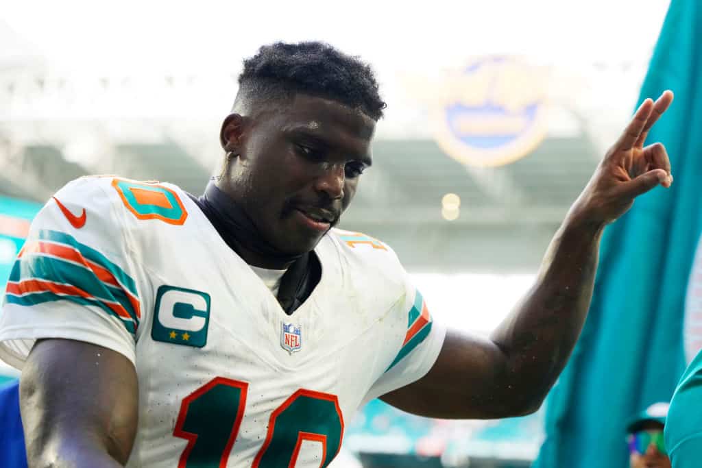 Tyreek Hill #10 of the Miami Dolphins gestures towards fans after his team's 31-17 win against the New England Patriots at Hard Rock Stadium on October 29, 2023 in Miami Gardens, Florida.
