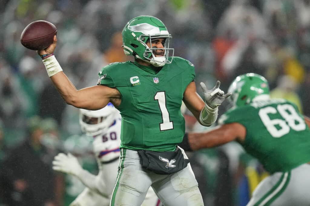 PHILADELPHIA, PENNSYLVANIA - NOVEMBER 26: Jalen Hurts #1 of the Philadelphia Eagles attempts a pass during the second quarter against the Buffalo Bills at Lincoln Financial Field on November 26, 2023 in Philadelphia, Pennsylvania.