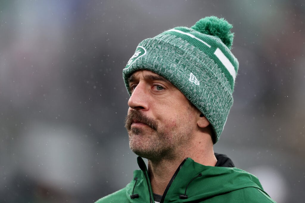 EAST RUTHERFORD, NEW JERSEY - DECEMBER 03: Aaron Rodgers #8 of the New York Jets looks on during warm ups prior to the game against the Atlanta Falcons at MetLife Stadium on December 03, 2023 in East Rutherford, New Jersey.