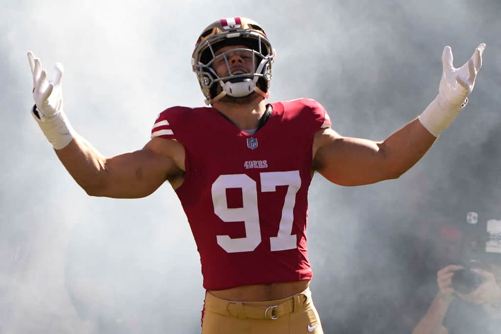 Nick Bosa #97 of the San Francisco 49ers reacts as he runs onto the field prior to a game against the Cincinnati Bengals at Levi's Stadium on October 29, 2023 in Santa Clara, California.
