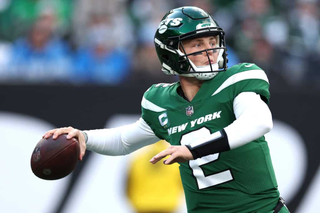 Zach Wilson #2 of the New York Jets throws the ball during the first half against the Detroit Lions at MetLife Stadium on December 18, 2022 in East Rutherford, New Jersey.