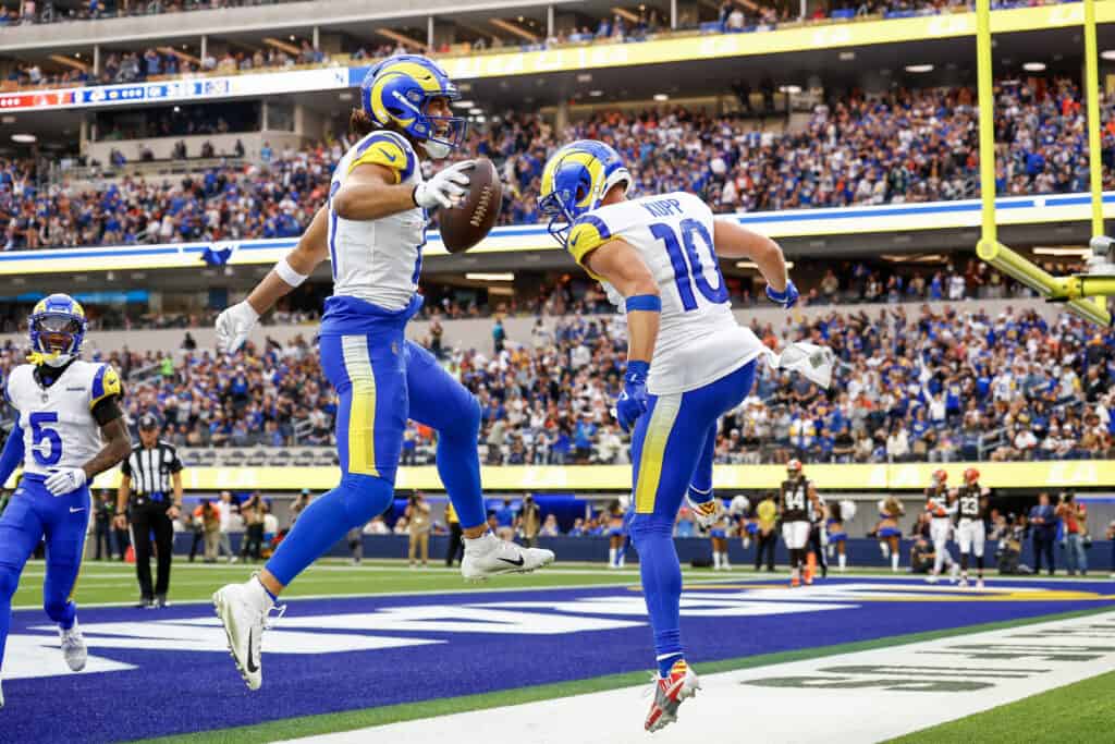 INGLEWOOD, CALIFORNIA - DECEMBER 03: Puka Nacua #17 and Cooper Kupp #10 of the Los Angeles Rams celebrate after Nacua scored a touchdown in the first quarter against the Cleveland Browns at SoFi Stadium on December 03, 2023 in Inglewood, California.