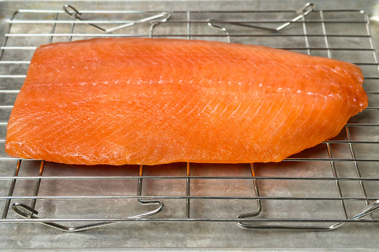 salmon filet on a wire rack